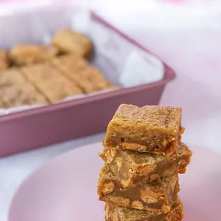 a stack of pieces of cake on a plate