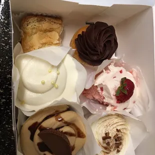 Don't mind the bite I took out of the strawberry cake! I couldn't resist!