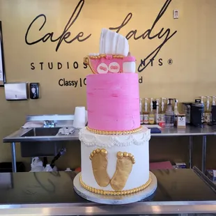 a pink and white cake