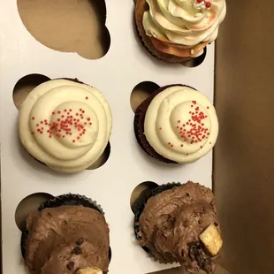 Mix of funfetti (top), red velvet (middle) and campfire (bottom) cupcakes.