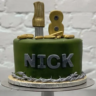 a cake with a knife on top