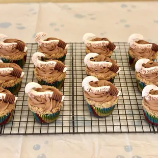 Maui inspired cup cakes from movie Moana . Topper is hand crafted and edible .