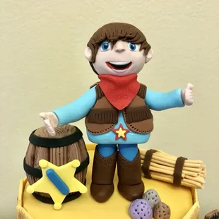 A little cowboy in a barn :)