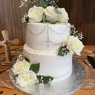 a wedding cake with white flowers