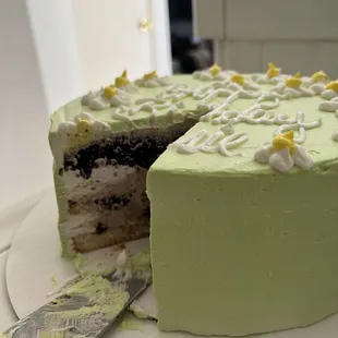 Layers with Vanilla cake, cream, &amp; chocolate mousse