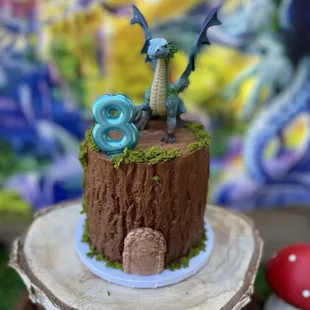 This was the cake we got, we added the dragon and the candle.