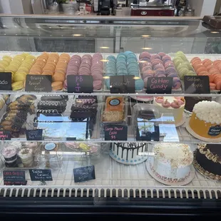 a display of cakes and pastries