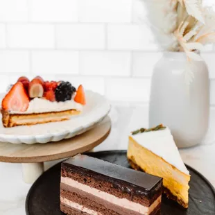 Assortment of cakes: Chocolate Cake $7.25 Pumpkin Cheesecake (seasonal) $7.95 Fruit Tart $7.95