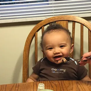 My great nephew enjoying his first George cake for his 1st birthday.  We all loved it!!