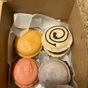 a variety of pastries in a box