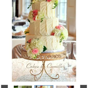 a wedding cake with flowers