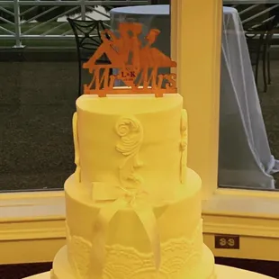 a yellow wedding cake