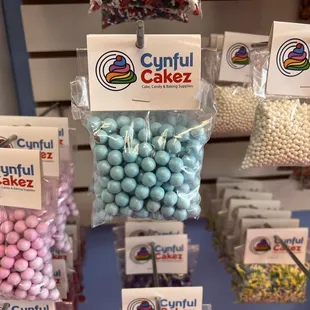 Other side has cake goodies for decorating, perfect for gender revel cakes