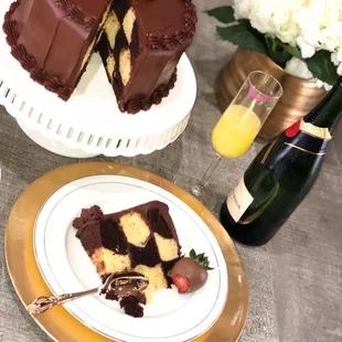 a chocolate cake with a slice taken out of it