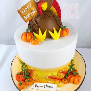 a cake with a turkey on top