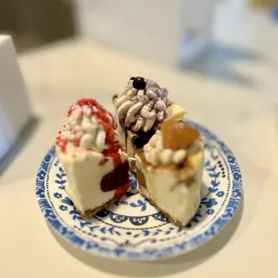 Slices of strawberry, blueberry dream, peach cobbler