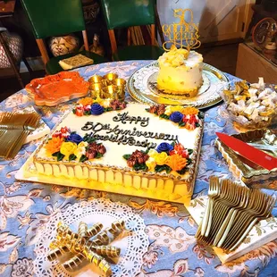50th Wedding Anniversary! Couples cake was gluten free, big cake was carrot, both beautiful and delicious.