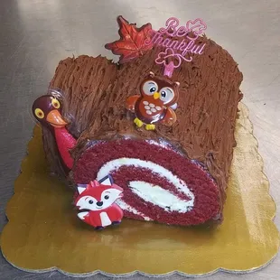 Red velvet, chocolate buttercream Yule log cake.