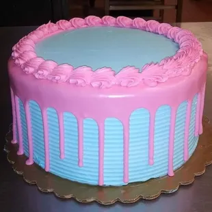 Pink royal icing, dripped buttercream cake