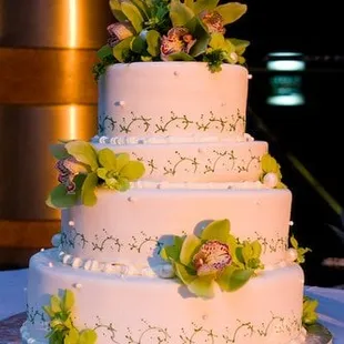 Adrienne F. our wedding cake by Maggie. She also decorated the real flowers on our cake.