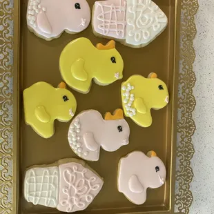 a tray of decorated cookies
