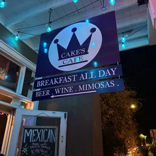 a sign for cake&apos;s cafe