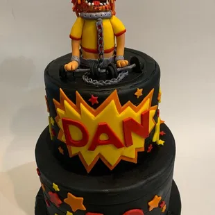 a cake with a cartoon character on top