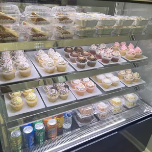a display case of cupcakes