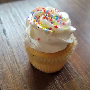 Vanilla cupcake with sprinkles