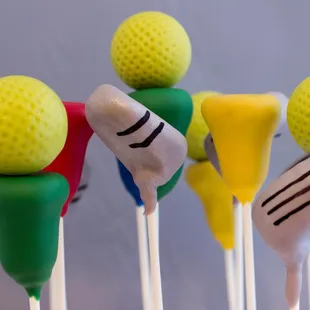 Golf tees, balls and clubs