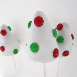 White Christmas trees with mini M&amp;M ornaments