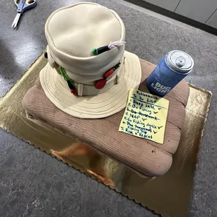 a cake with a hat on top
