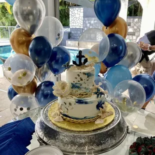 Our delicious 2 tiered cake, first layer Nina&apos;s famous pound cake (family recipe) and the top layer is a yellow cake.