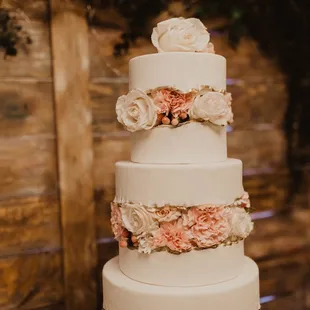 a three - tiered wedding cake