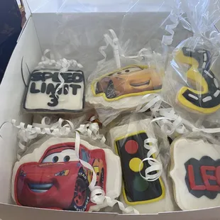 a box of decorated cookies