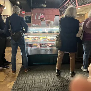 At the cupcake counter.... Hard choices to be made!