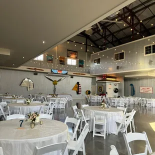 View of reception tables in hangar.