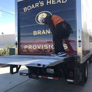 a man on the back of a truck