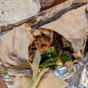 Chicken Gyros Sandwich via Uber Eats. $14.95. Slow-cooked, thin-sliced, marinated chicken.