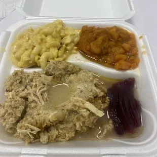 Chicken and dressing/cranberry sauce, mac and cheese and sweet potatoes