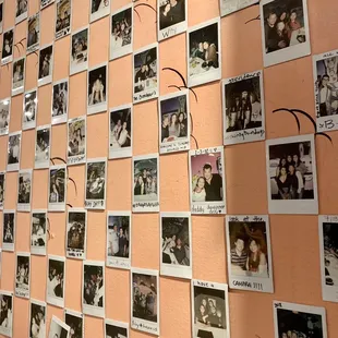 a wall full of photos