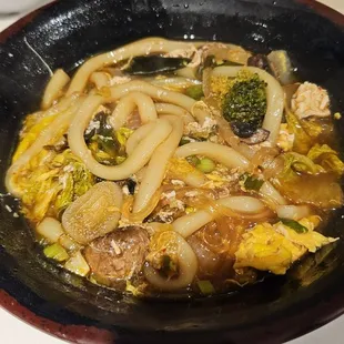 Ask for an extra bowl and put your cooked stuff in it.