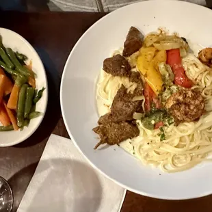 Cajun shrimp and filet-mignon tips on linguini