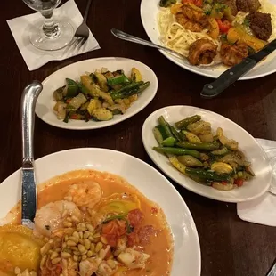 Lobster ravioli, Cajun filet mignon and gulf shrimp with linguini, sides of vegetables of the day