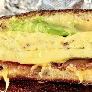 Layers of Love!!! The Calabama breakfast sandwich with bacon is silky good deliciousness!