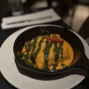 a skillet of food on a table