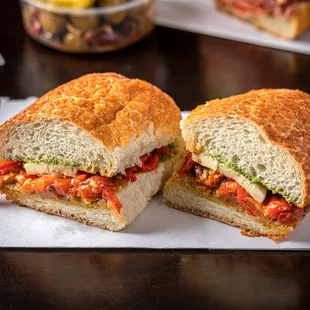 a sandwich cut in half on a plate