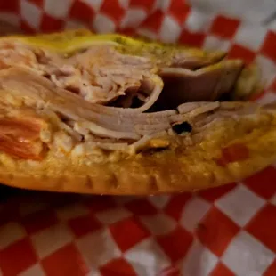 a chicken sandwich in a basket