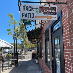 a sign for the back patio