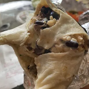 Burrito is cold and tortilla soaking wet